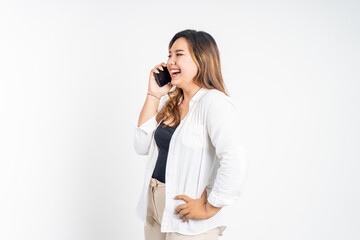 happy asian woman making a call using a cell phone