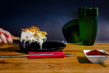 While serving the cauliflower gratin in the oven