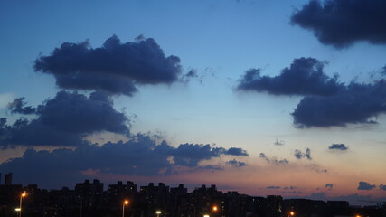 The beautiful sunset view with the colorful sky and clouds as background in summer