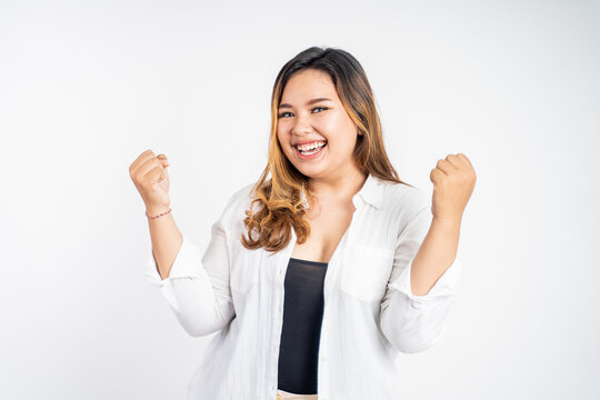 woman with open palm hands while celebrating success