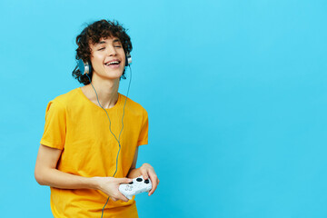 gamer yellow T-shirt with joystick video games isolated backgrounds