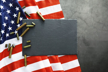 American flag on a gray background. Military background with bullets. USA and EU collective west.