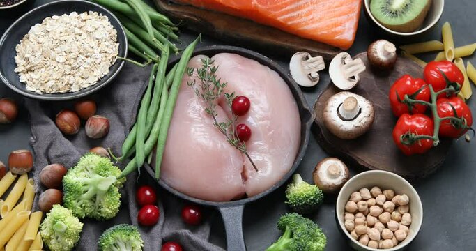 Healthy food concept. Balanced eating, top view, rotate. Raw organic food.