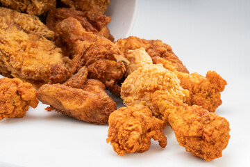 Fried chicken in paper bucket isolated on white background, Fried chicken on white.