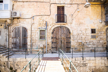 Urban decay with old doors on the island of Malta	