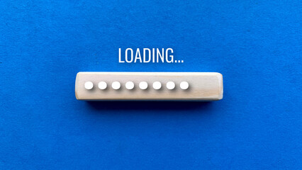 Top view of loading bar with blue texture background.Digital concept