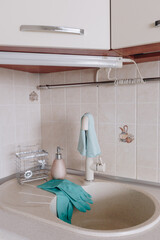clean sink in beige kitchen