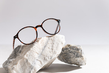 Clear Eyeglasses Glasses with plastic Frame Fashion Vintage Style on gray Background, trendy Still...