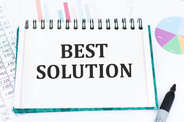 BEST SOLUTION inscription on a notebook on an office desk, business concept