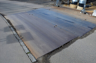 protection of the cobbled road or sidewalks from damage by working machines or heavy construction...