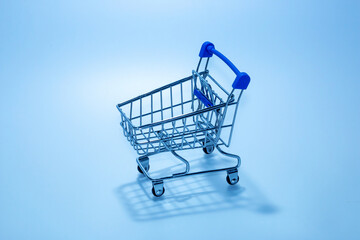 Shopping cart in the moonlight, the concept of stagnate business