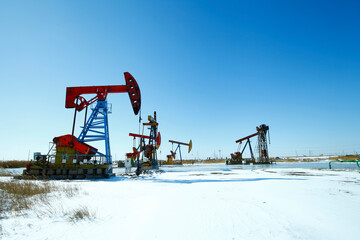 Oil pump, oil industry equipment in the snow