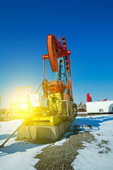 Oil pump, oil industry equipment in the snow