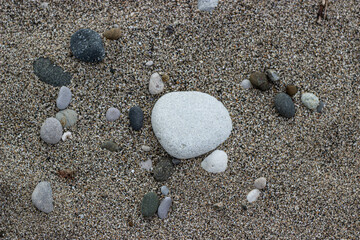 whight stone on the  sand of black sea coast