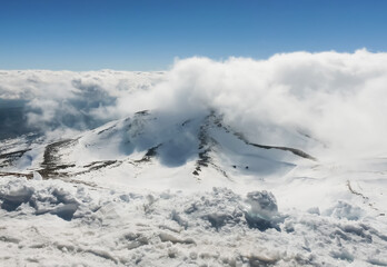 Fototapeta na wymiar Mount Hermon in the Golan Heights covered with snow and clouds