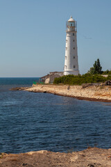 Fototapeta na wymiar Tarkhankut lighthouse on the coast of the Crimean peninsula
