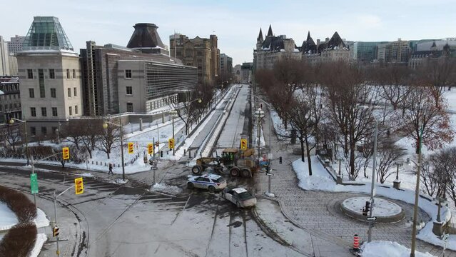 Aerial drone shot accross empty crossroad in downtown where Freedom Convoy truckers in Ottawa, Canada had occupied to protest government public health mandates.