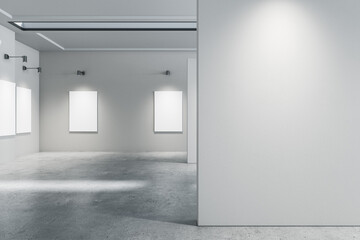 Modern concrete gallery interior with empty white mock up posters. Exhibition concept. 3D Rendering.