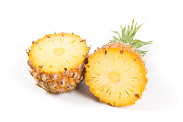 Fresh pineapple (Ananas comosus)  with slices isolated on white background