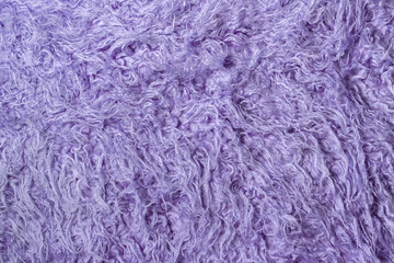 Purple faux fur. The texture of the fur.