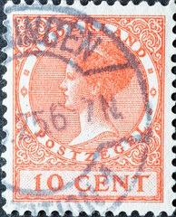 Netherlands - circa 1924 : a postage stamp from the Netherlands , showing a portrait of Queen...