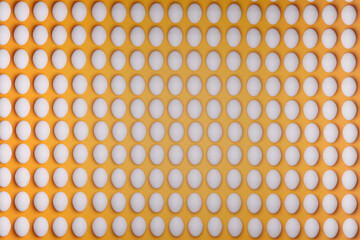 Pattern from white chicken eggs on yellow background top view. Creative food minimalistic background.