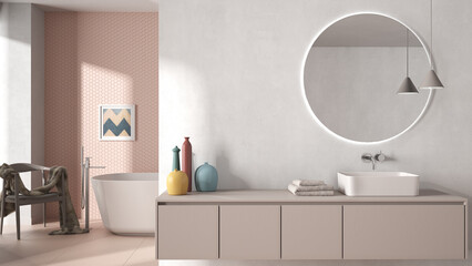 Naklejka na ściany i meble Cozy minimalist bathroom in pastel tones, washbasin with mirror, bathtub, tiles and concrete walls, armchair, colored vases and decors, interior design project concept idea
