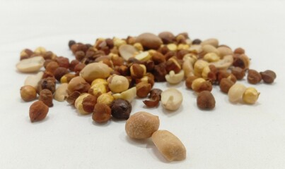 Peanut And Hazelnut Both On White Background