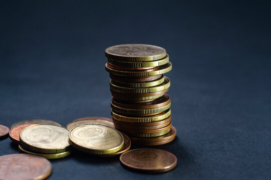 Pile Coin, Quarters, Nickels, Dimes, Pennies, Fifty Cent Piece.