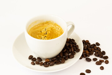 the netherlands, january 2022. A cup of coffee, coffee beans on a white background.