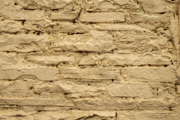 Warm tone stone painted wall texture. Abstract background for design.