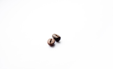 Two coffee beans on a white background. Isolated coffee beans.