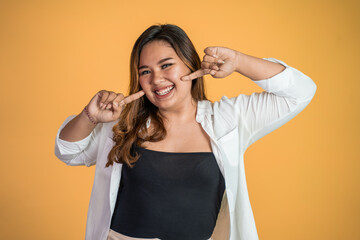 confident young asian woman portrait smiling to camera