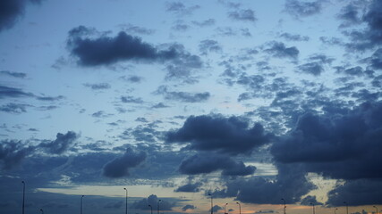 The beautiful sunset view with the colorful clouds and sky in the city