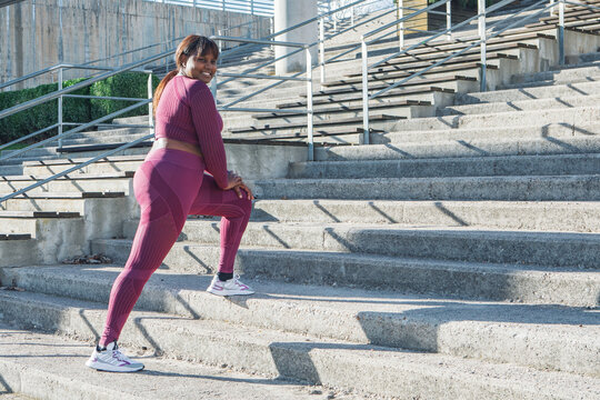 Young Black Woman Exercising, Running Up Steps