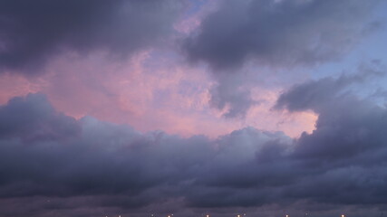 The beautiful sunset view with the colorful clouds and sky in the city