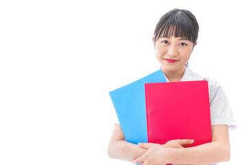 Obraz premium オフィスで書類を確認する若いビジネスウーマン