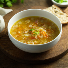 Traditional pea soup with smoked bacon