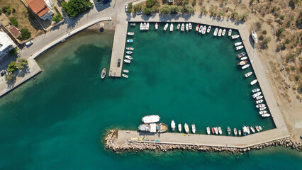 Aerial drone photo of picturesque seaside village and beach of Eratini in Fokida prefecture as seen in summer, Greece