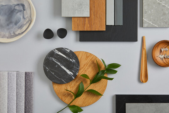 Elegant Architect Moodboard Flat Lay Composition In Light Grey, Black And Brown Color Palette With Textile And Paint Samples, Wooden Panels And Marble Tile. Top View. Copy Space. Template.