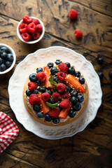 Homemade berry cake with cream filling