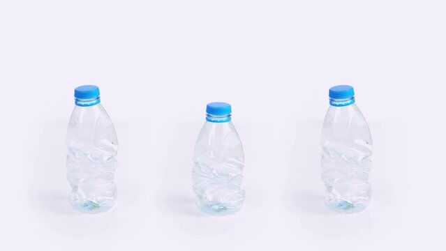 Plastic bottle crushing  time lapse on white background funny Plastic pollution concept endless loop