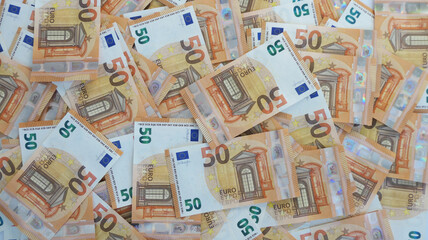 Fototapeta na wymiar 50 euro banknotes spreaded flat background 