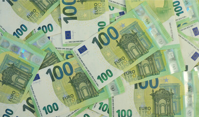 spreaded 100 euro banknotes background flat