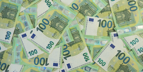 100 euro banknotes spreaded flat background  - obrazy, fototapety, plakaty