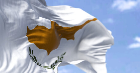 Detail of the national flag of Cyprus waving in the wind on a clear day
