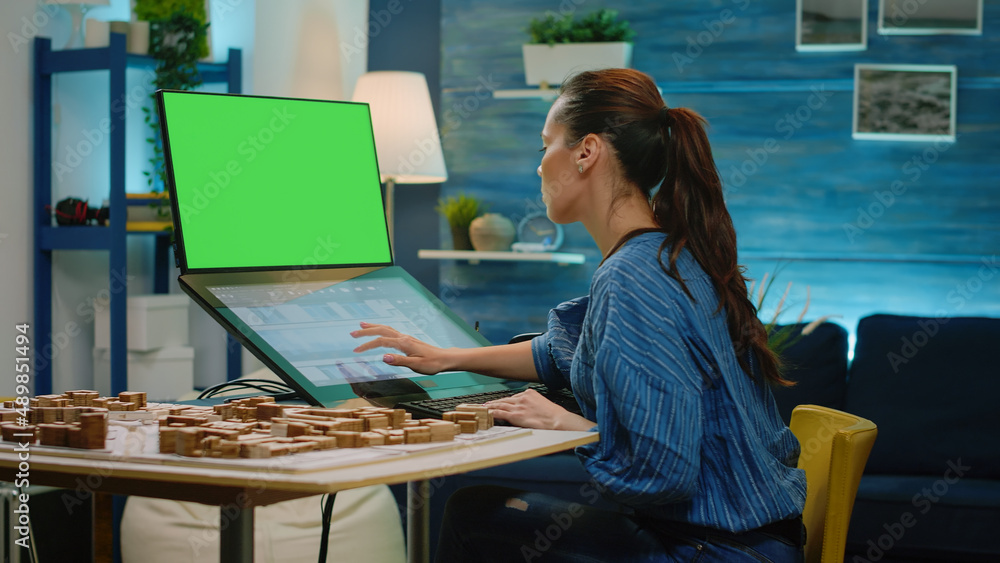 Poster woman working as architect using green screen and architectural equipment. engineer designing buildi
