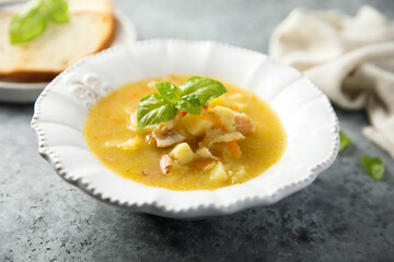 Traditional pea soup with smoked bacon