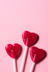 Red Heart shape lollypop background. Love concept