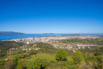 Cityscape seen from Kuzum Baba hill. Aerial city view, city panorama of Vlore city center